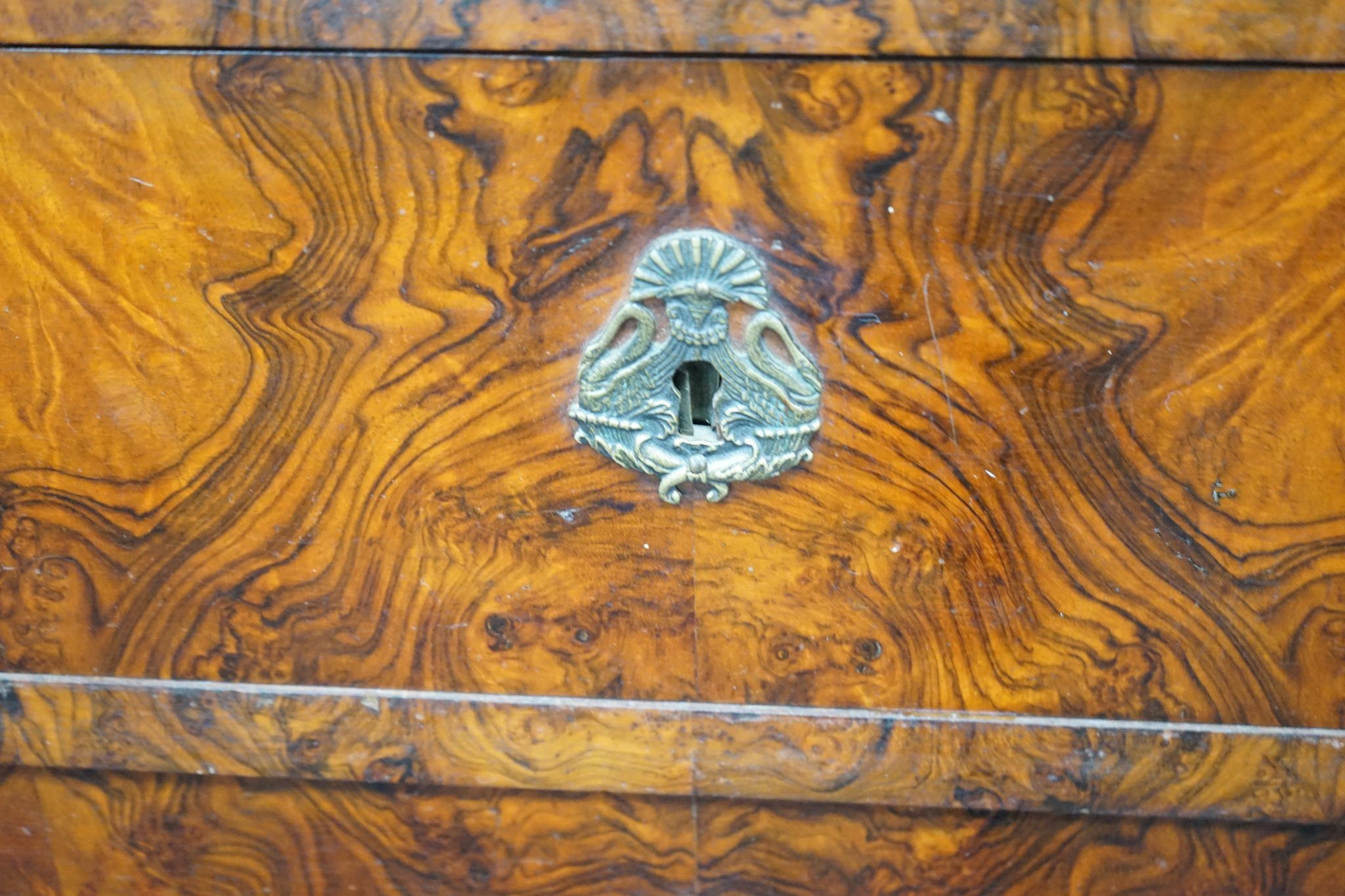 A 19th century French marble top walnut commode, width 129cm, depth 60cm, height 104cm